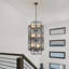 Lustre long avec escalier 12 lumières