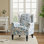 Fauteuil d'appoint à oreilles bleu avec garniture cloutée Duward
