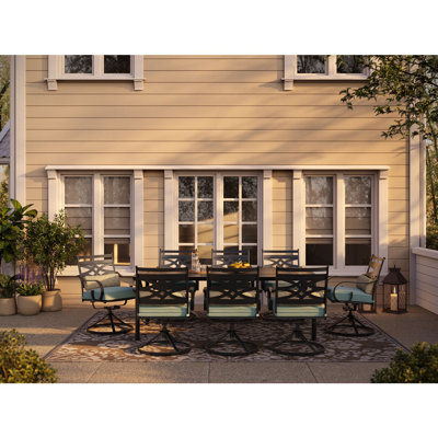 Canora Grey Elmfield 9-Piece Dining Set In Navy Blue With 8 Swivel Rockers And A 42-In. X 84-In. Table, 4CCC15D086C845389DEC1A7B4D66593E by Canora Grey