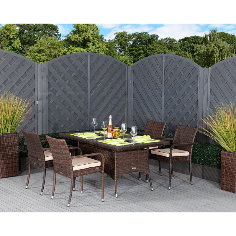 Flaherty 4 - Person Patio Dining Set Umbrella Hole Included Rectangular Table with Cushions Included, Chocolate/Coffee Cream