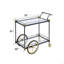 Chariot de service en verre transparent et finition noire / or