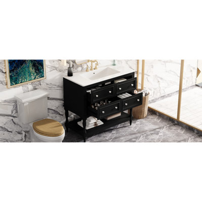 Meuble-lavabo de 36 po avec lavabo - finition noire. Structure en bois massif, rangement à 4 tiroirs. Lavabo en céramique encastré. Ajout élégant. Facile à assembler et à structurer. Tiroirs. Bassin. Décoration élégante. Assemblage