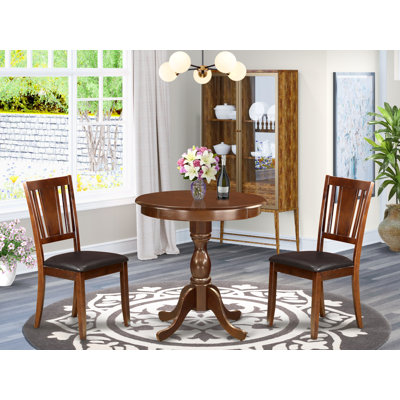3 Piece Dining Room Table Set Contains a Round Dining Table with Pedestal and 2 Faux Leather Chairs, Mahogany