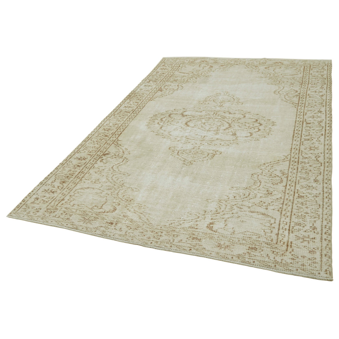 Handgefertigter Teppich Egan aus Wolle in Beige