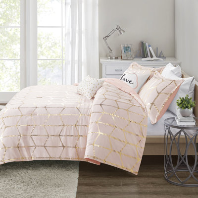 Édredon contemporain avec texture géométrique métallique et or pour un look de chambre à coucher moderne