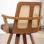 Chaise moderne rembourrée en similicuir à dossier en rotin-745583692