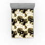 Moutarde / noir / motif floral blanc