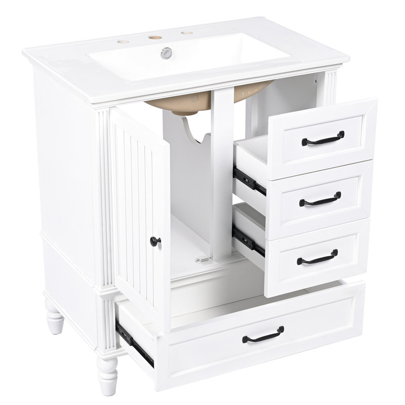 Meuble-lavabo de 76 cm (30 po) avec finition peinte en blanc, pieds en bois et portes à fermeture amortie. Meuble autoportant de 76 cm (30 po), lavabo en céramique, pieds réglables.