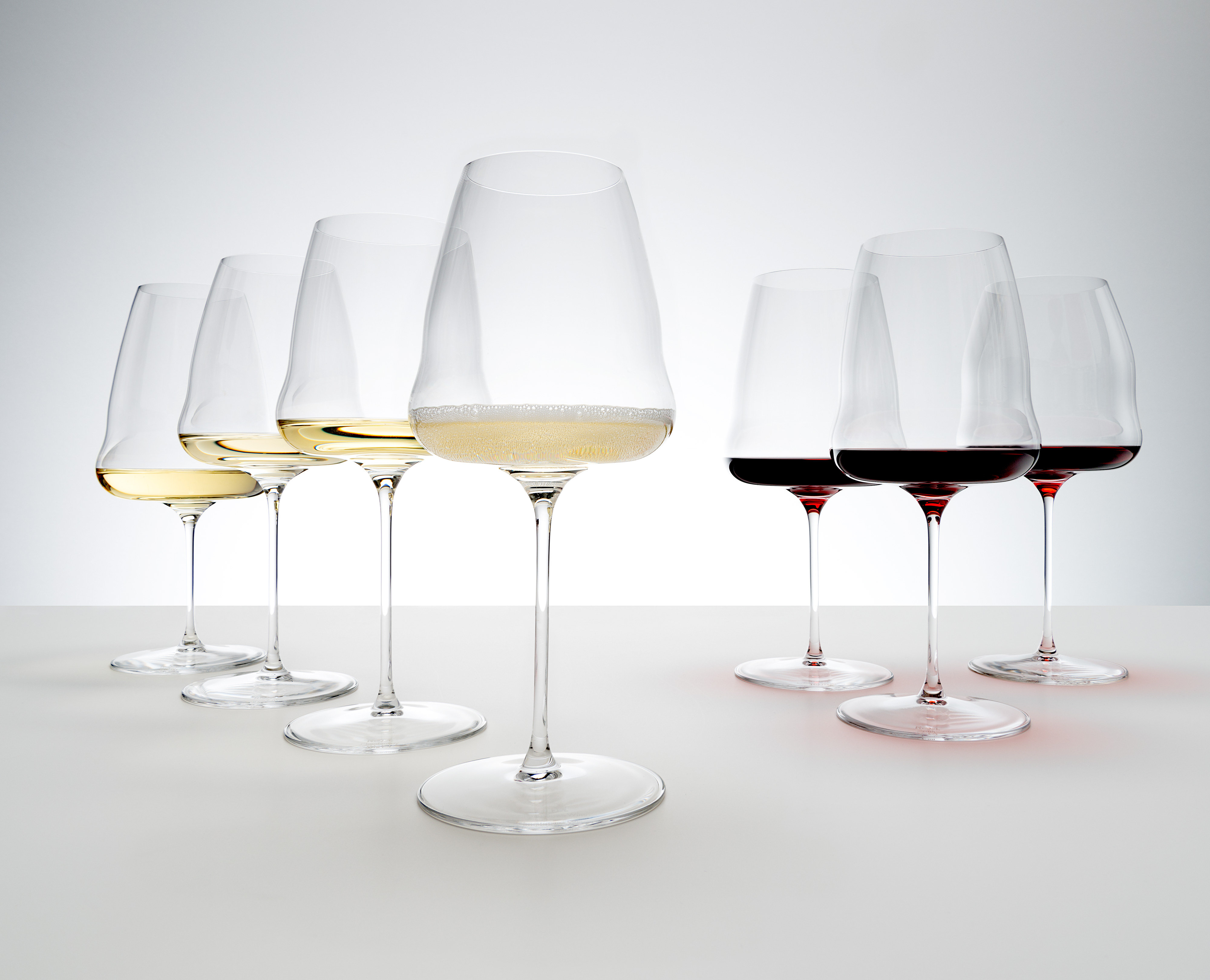 https://assets.wfcdn.com/im/04879350/compr-r85/2457/245747717/riedel-winewings-pinot-noir-wine-glass-pay-3-get-4.jpg