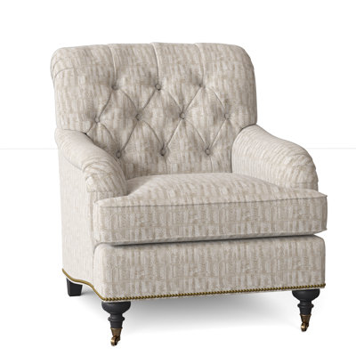 Fauteuil à coussin en duvet capitonné Devan
