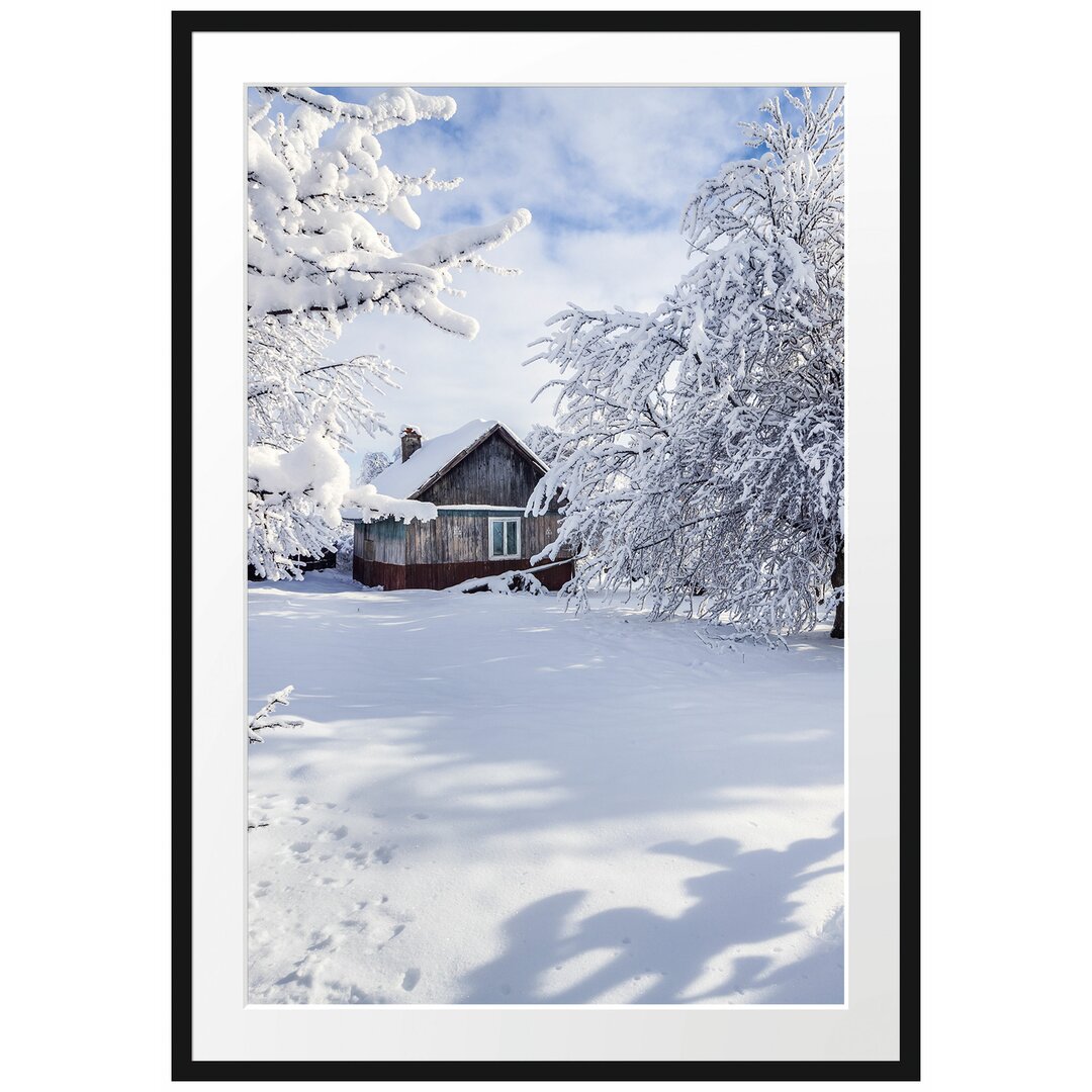 Gerahmtes Poster Winterlandschaft mit Hütte