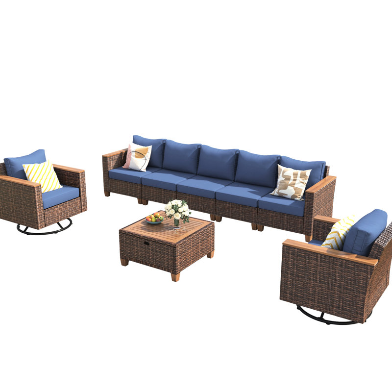 8 chaises d'extérieur avec chaises pivotantes, sièges profonds, table, coussins bleus, bascule bleue, fondu