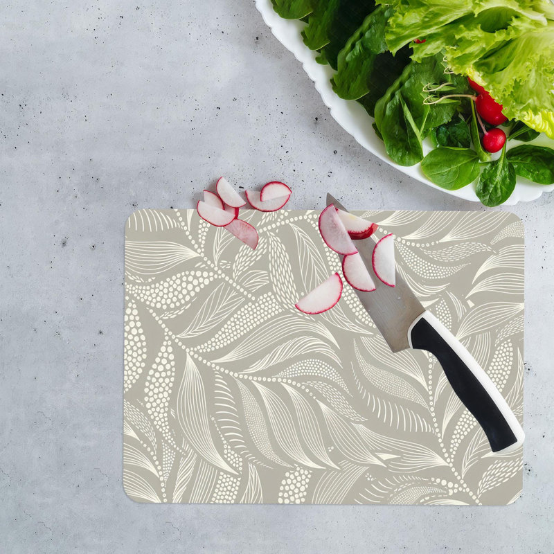 Planche à découper en verre moderne à motif de feuilles, parfaite pour ajouter une touche minimaliste et élégante à votre décor de cuisine