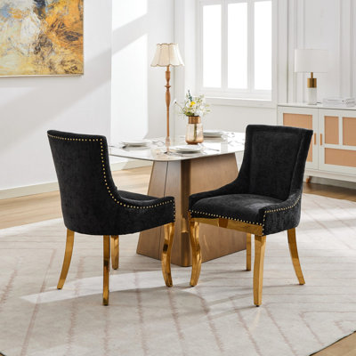 De 2 chaises de salle à manger en chenille américaine moderne, tissu texturé noir, garniture de rivets, pieds incurvés dorés et fabrication pour utilisation