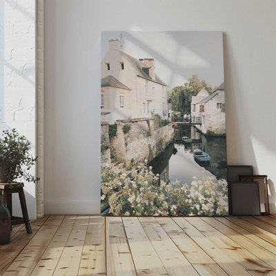 Serene Village Waterscape Stretched Canvas Print