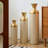 Set Of 3 Tall Metal Decorative Vases With Golden Finish And Dot Texture, Ideal For Layered Floor Display And Modern Interior Styling.