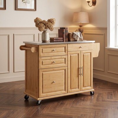 Îlot de cuisine intérieur fabriqué en bambou, plateau en acier inoxydable antirouille de qualité supérieure, équipé de plusieurs tiroirs de rangement, d'une armoire fermée et d'un porte-serviettes, d'un chariot de rangement mobile écologique pour