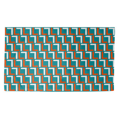 Tapis géométrique vert / rouge / blanc
