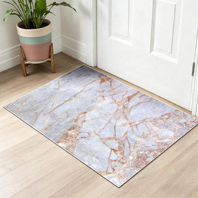 Tapis intérieur rose doré à motif abstrait lavable à la machine doré
