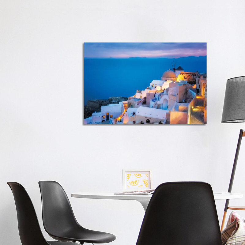 Europe, Greece, Santorini, Oia. Sunset On Coastal Town. by Jaynes Gallery - Wrapped Canvas Print