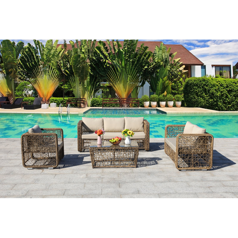 Ernson Wicker 6 - Person Patio Conversation Set with Cushions