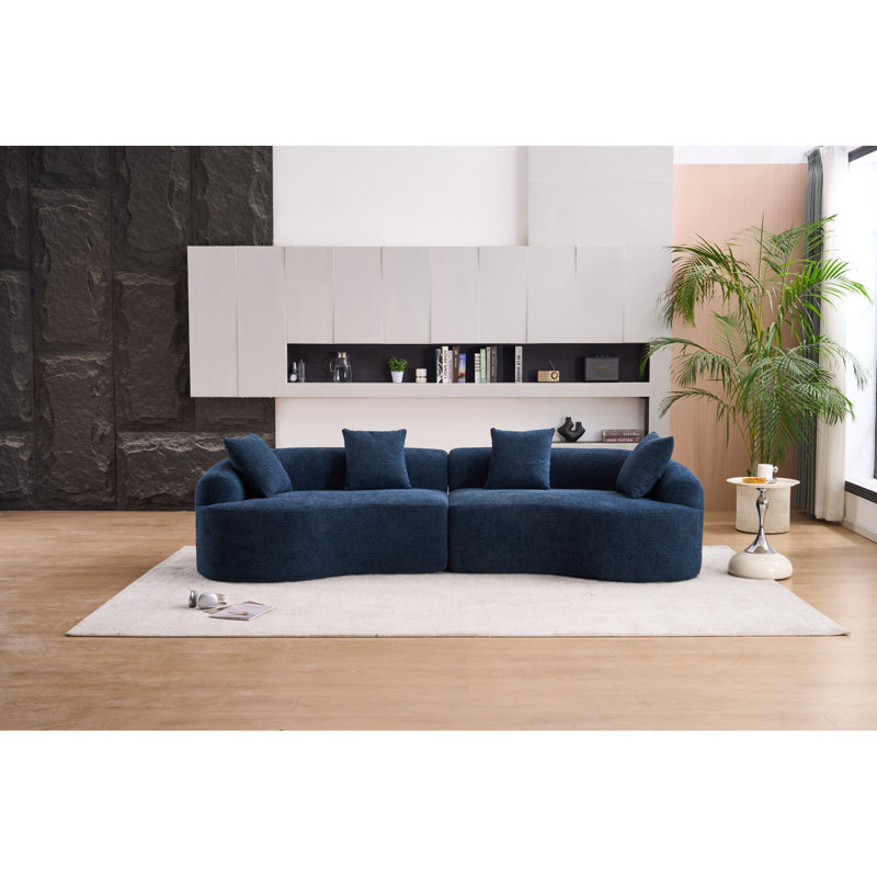 Canapé bleu en chenille avec motif courbé