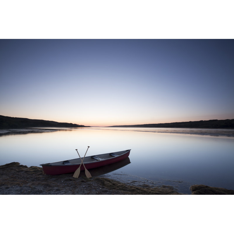 Canoe On The Shore Line Of Buffalo Pound Provincial Park Saskatchewan Canada by Mysticenergy - No Frame Print on Canvas