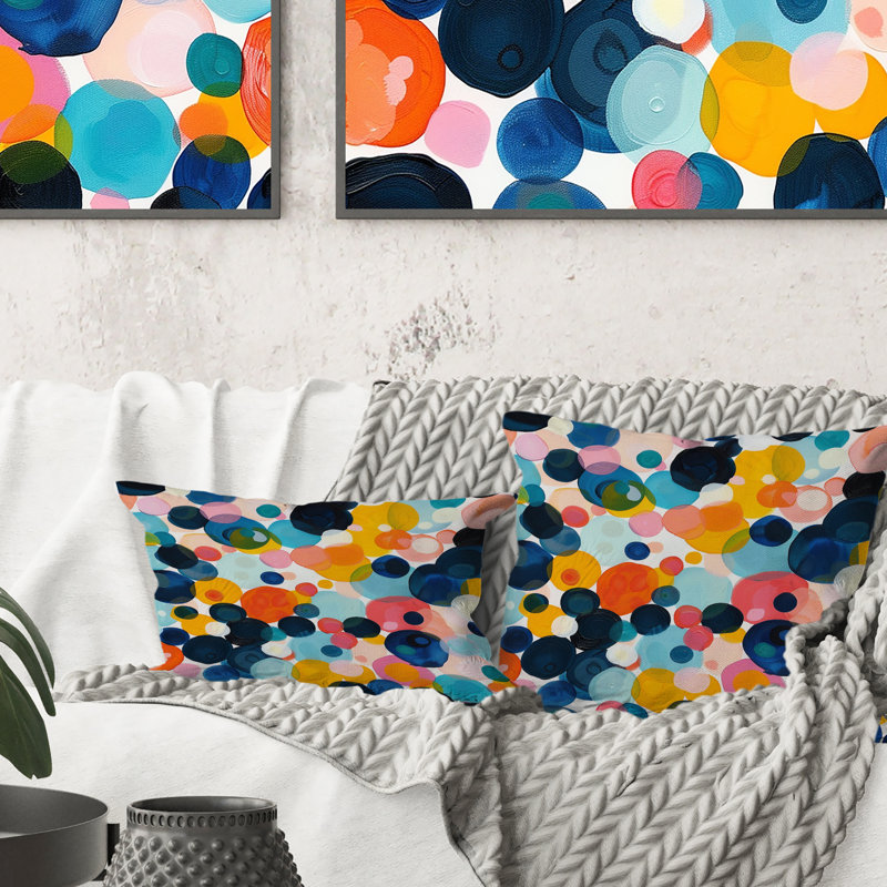 Coussin lombaire à pois orange et noir I