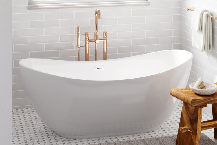 freestanding acrylic bathtub with gold freestanding faucet