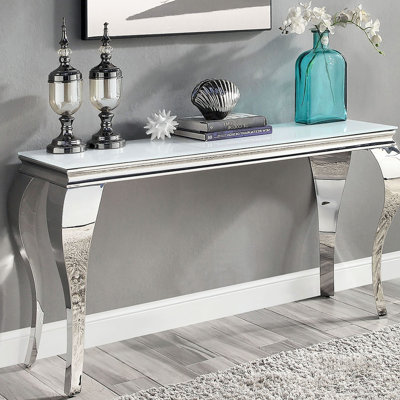 Console glamour avec pieds de style argent et plateau en verre blanc de style transitionnel biseauté