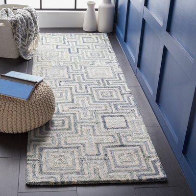 Tapis ivoire / bleu touffeté à la main Gladies