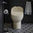 Chateau One-Piece Elongated Dual-Flush Toilet in Bisque 1.1/1.6 gpf-44638029