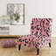 Fauteuil de chambre rose avec motif léopard et tigre rose