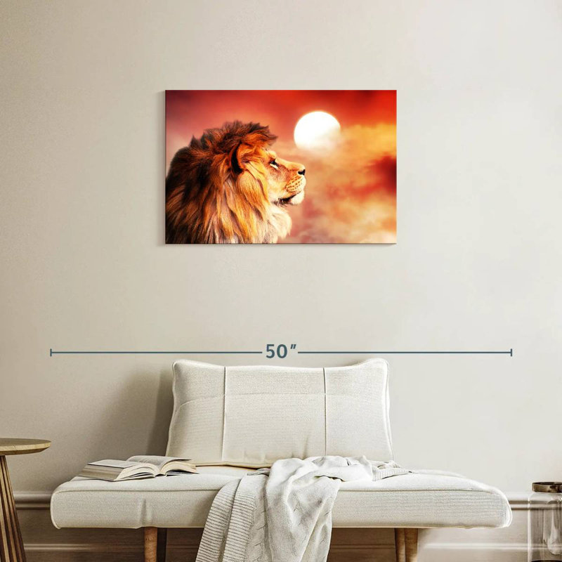 Lion surplombant un coucher de soleil, H 20 po x l 30 po