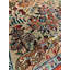 Meikel Oriental Area Rug in Gold