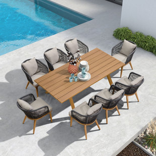 https://assets.wfcdn.com/im/04974801/resize-h310-w310%5Ecompr-r85/2413/241324859/braylin-8-person-rectangular-outdoor-dining-set-with-cushions.jpg