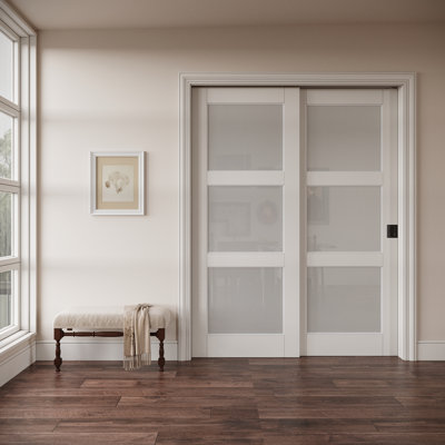 Porte coulissante en verre givré blanc