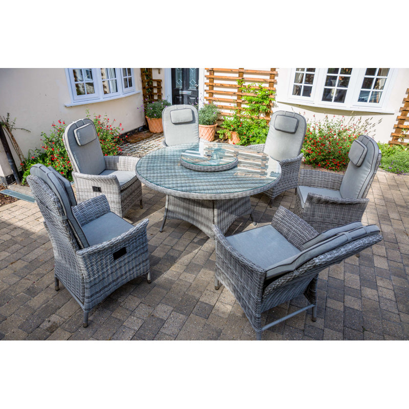 Jaffrey 6 - Person Wicker Patio Dining Set with Round Table , Cushions Included, Light Grey, Grey