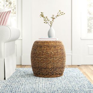 Wicker mat with clean cotton pads and bottle of essential oil on table,  closeup Stock Photo - Alamy