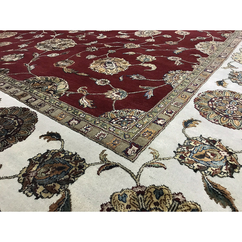 Tapis rouge et ivoire noué à la main de haute qualité