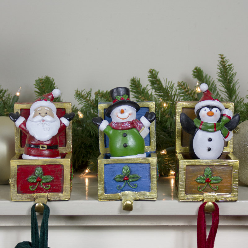 Santa, Snowman, and Penguin Christmas Stocking Holders Set