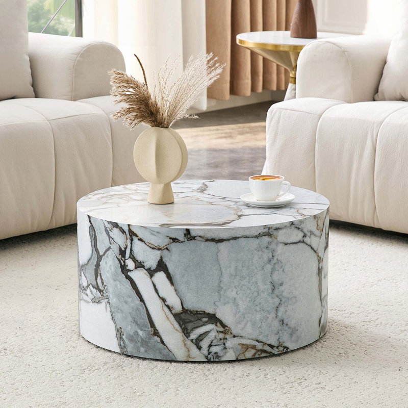 Table basse cylindrique texturée en marbre blanc