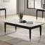Table basse de style contemporain avec plateau en pierre frittée et pieds en flèches argentées avec finition noire et blanche