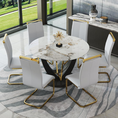 Ensemble de table de salle à manger 48 po pour 6 personnes, ensemble de 6 chaises de table en marbre, table ronde avec pieds en panneau de fibres à densité moyenne noir et structure en métal doré, 6 chaises de salle à manger en polyuréthane doux avec pieds en métal, pour la cuisine, la salle à manger.