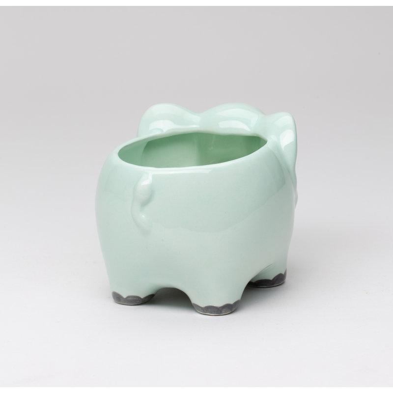 Petit pot de fleurs vert éléphant