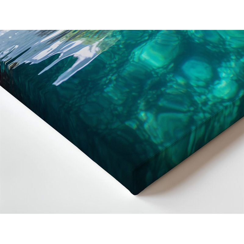 Toile, une scène de grotte sous-marine sereine capturée de l'intérieur d'une arche naturelle mettant en valeur une eau turquoise transparente