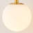 2-Light Brass Wall Sconce With Frosted Glass Globes
