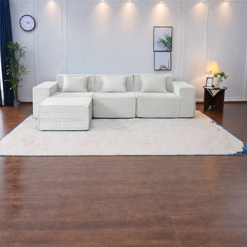 Canapé modulaire spacieux avec repose-pieds, tissu en velours côtelé, usage domestique moderne