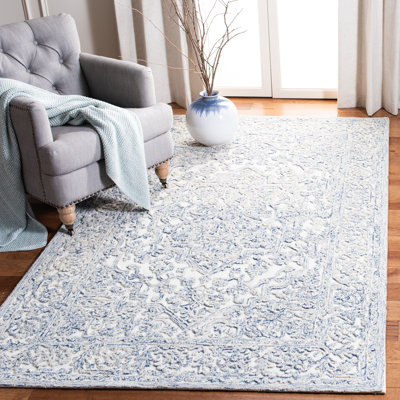 Tapis bleu / ivoire en laine touffeté à la main Conard