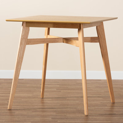 Lapinski Solid Wood Base Dining Table